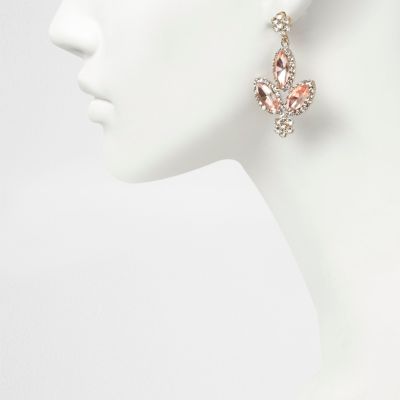 Gold tone pink gem dangly earrings